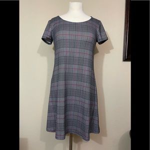 Dress, super soft and flowy. Skims the top of the knee.